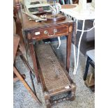 Inlaid mahogany single drawer drop side table with cane footstool in need of repair