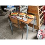 Childs wooden desk on tubular metal supports with similar childs chair and 1 small folding metal