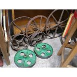 3 various pairs of cast iron wheels with 1 further larger 6 spoke metal wheel