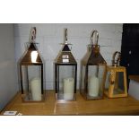 Set of 3 copper effect glass lanterns with matching wooden lantern