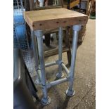 Pine seated stool on tubular metal scaffold frame