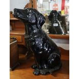 Large black ceramic dog ornament
