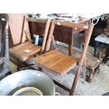 Pair of folding wooden chairs