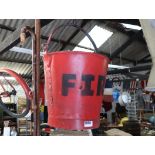 Red painted vintage fire bucket