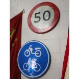 2 circular road signs; '50mph' and 'bikes and mopeds'