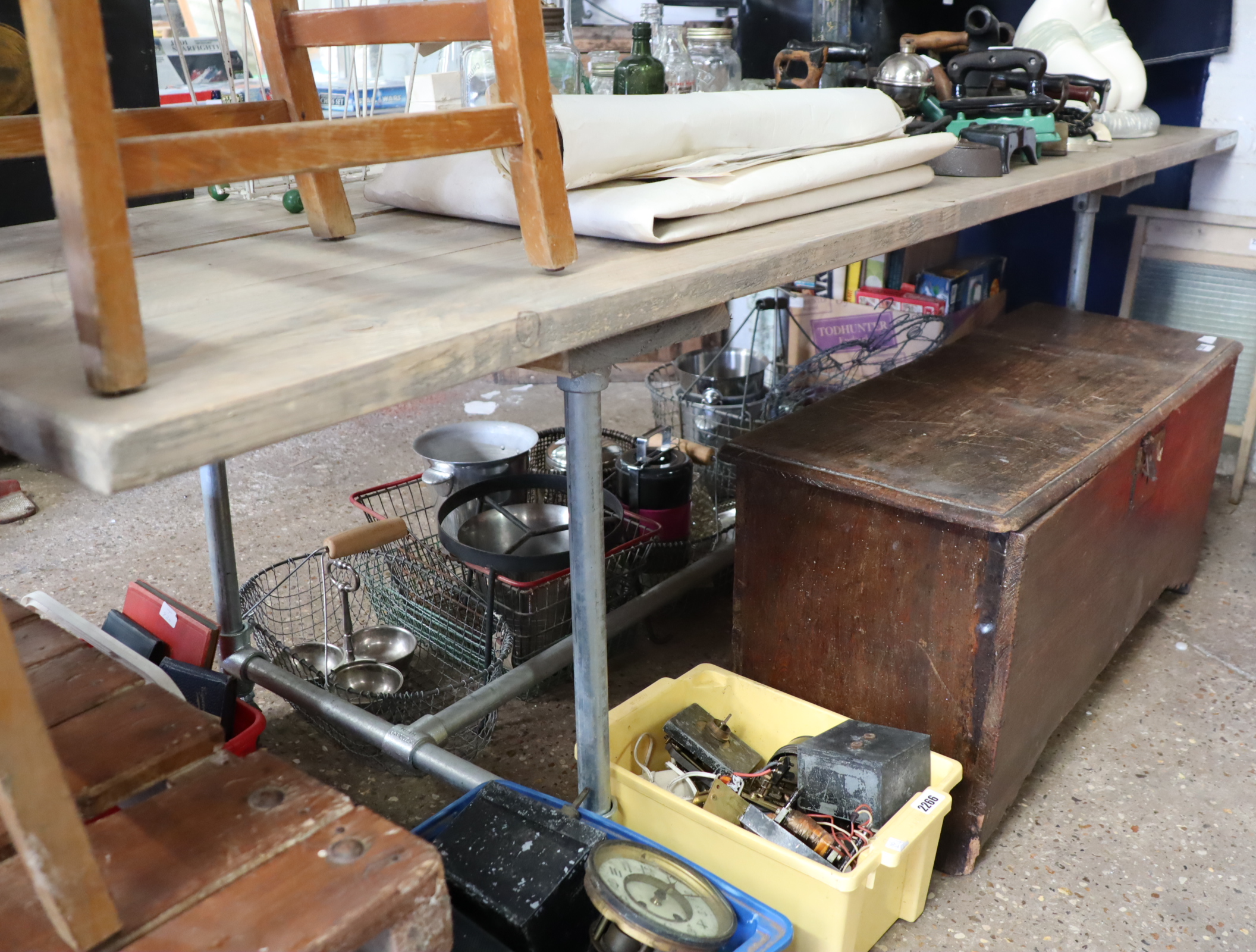 Wooden work table on tubular metal scaffold type support