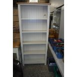 (2150) Cream 4 shelf bookcase (damage to back board)