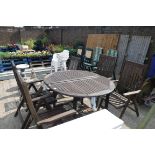 Teak circular garden table with 4 matching chairs and sun lounger