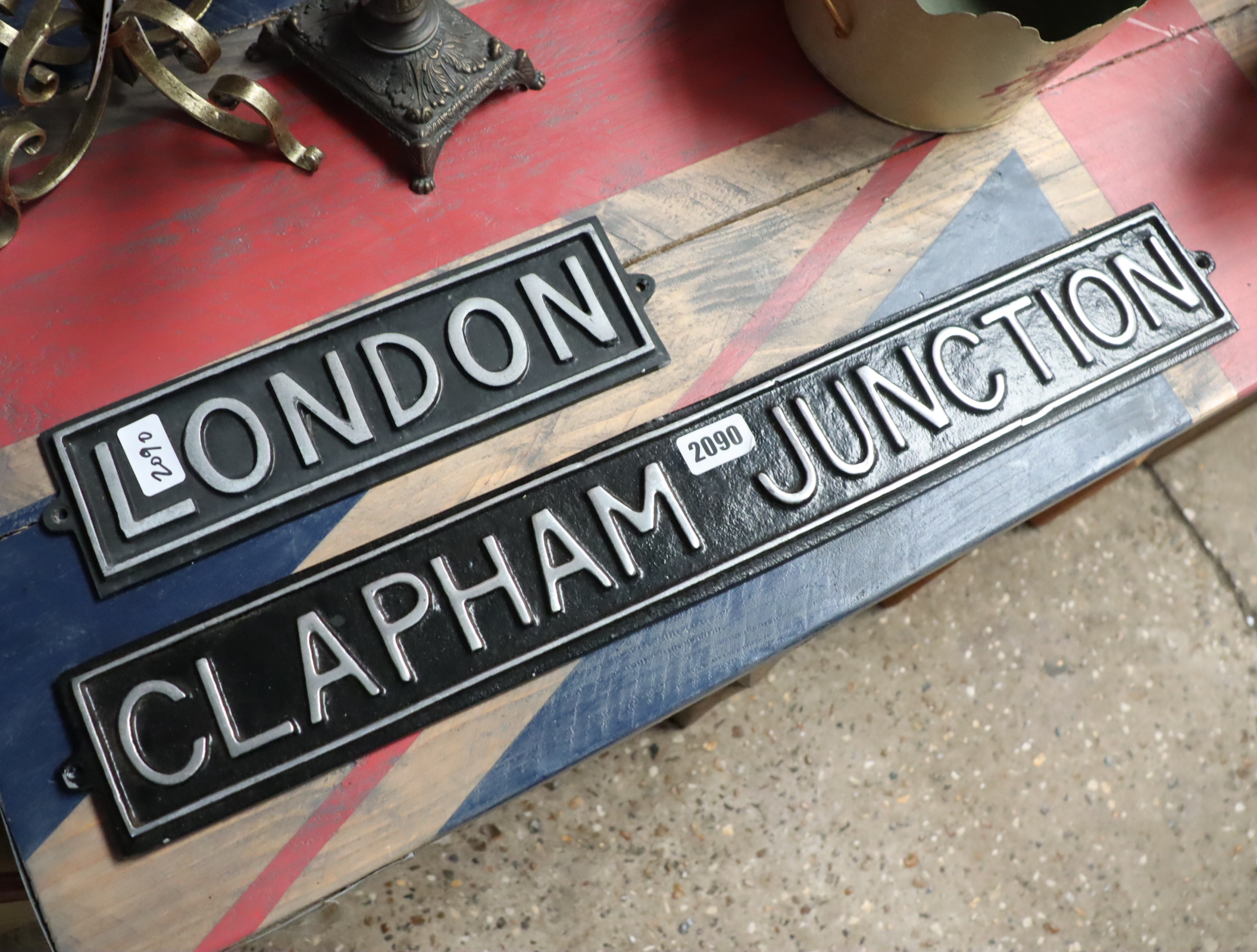 2 reproduction cast metal road signs; 'Clapham junction' and 'London'