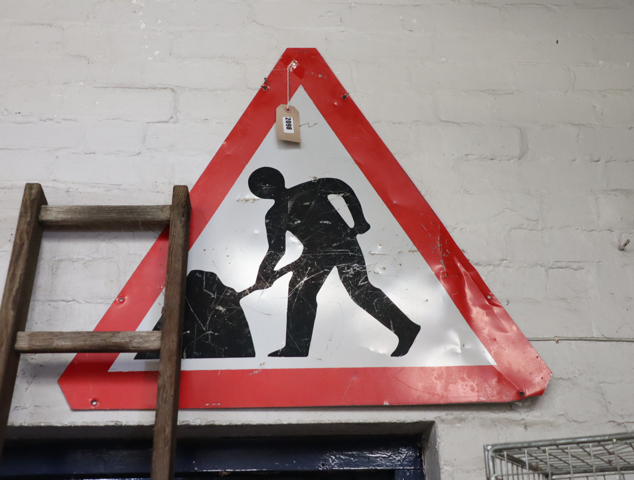 Road sign; 'Men at work'