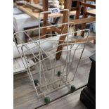 Wirework magazine rack in the manner of Eames