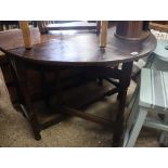 Dark oak oval drop leaf dining table