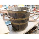 Wooden twin handled bucket with brass feet, banding and handles