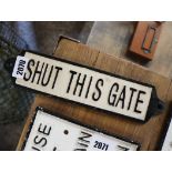 Reproduction cast iron 'Shut this gate' plaque
