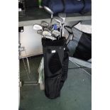 Unbranded golf bag containing Hunter branded golf clubs and umbrella