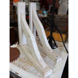 Pair of white painted wooden porch brackets