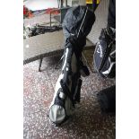 Sun Mountain golf bag containing Dunlop golf clubs