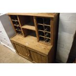 Pine cabinet with wine rack over