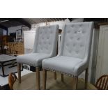 (22) Pair of cream cloth button back dining chairs