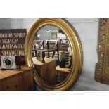 Oval gilt framed mirror