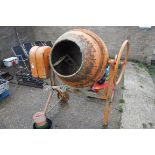 Large cement mixer on stand