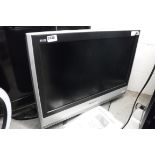 Panasonic 26'' TV on stand with remote control