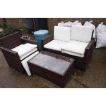 Rattan suite comprising 2 seater sofa, chair and glass top coffee table