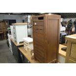 Wooden single door cupboard with small wooden multi drawer unit and pair of beech shelves