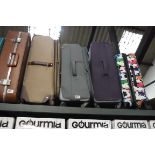 4 large luggage cases