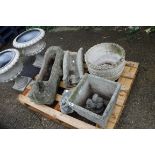 Pallet of various concrete ornaments and planters