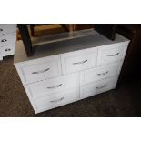 White painted chest of 3 over 4 drawers