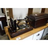 Cased Singer sewing machine