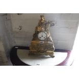 Ornate brass cased mantle clock