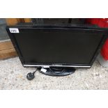 Tech Wood 19'' TV on stand with remote control in office