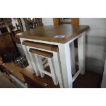 (11) Nest of 3 contemporary tables with oak tops and cream supports