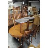 Oval mid century teak effect extending dining table with 4 upholstered slat back dining chairs *
