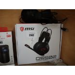 1 boxed and 1 unboxed pair of MSI gaming headphones