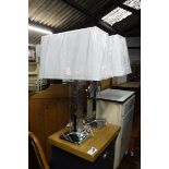 Pair of glass and chrome table lamps with rectangular profile white shades