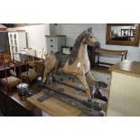 Childs wooden rocking horse