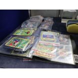Collection of Pokemon cards, many in card protectors