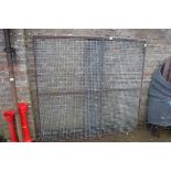 Pair of metal cage doors