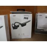 Pair of boxed Aftershokz Air wireless bone conduction headphones