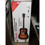 Boxed Fender acoustic guitar