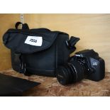 Canon DS126701 camera with case
