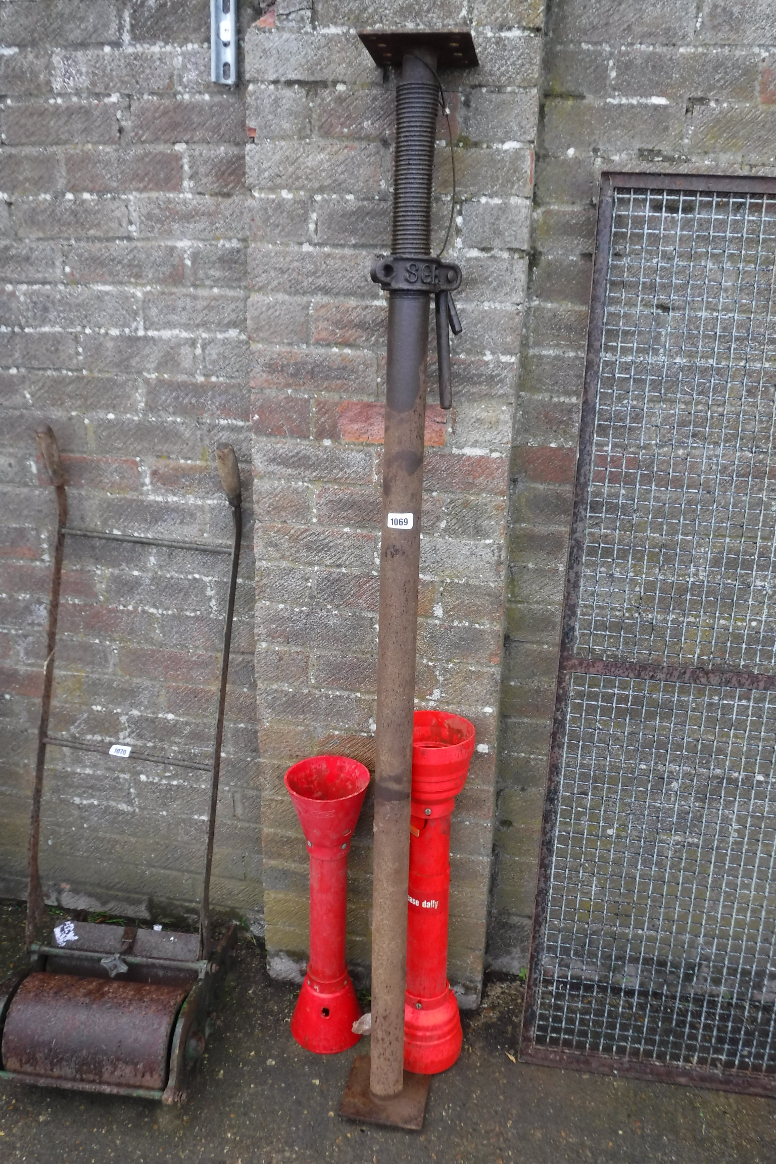 Acro prop with pair of red plastic stands