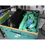 Crate containing lifting straps and seat cushions