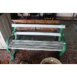 Wooden garden bench with cast iron bench ends