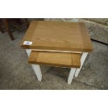 (35) Nest of 2 white coffee tables with oak surfaces