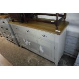 Grey sideboard with oak surface