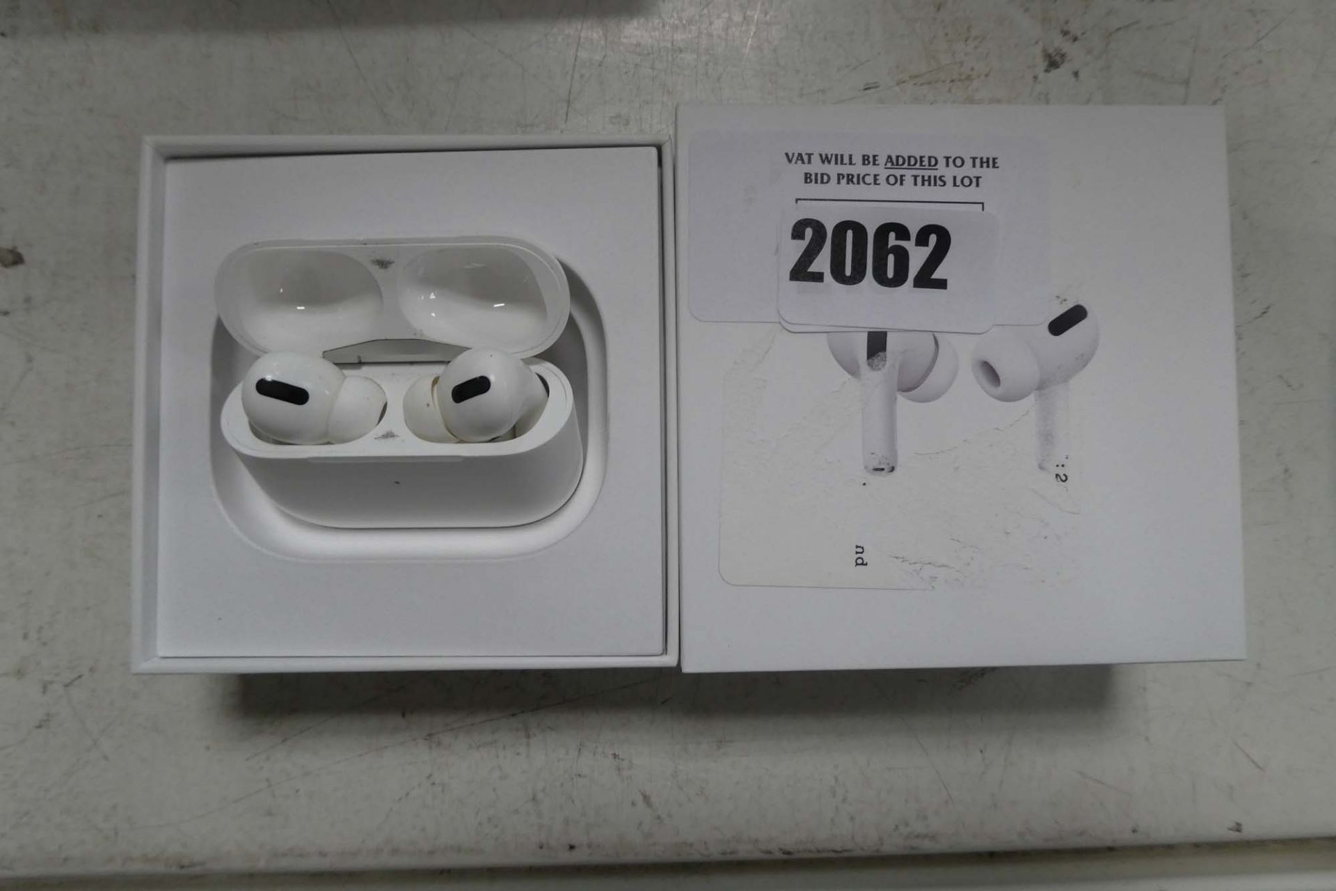 2102 Boxed pair of Apple AirPods Pro with wireless charging case and box